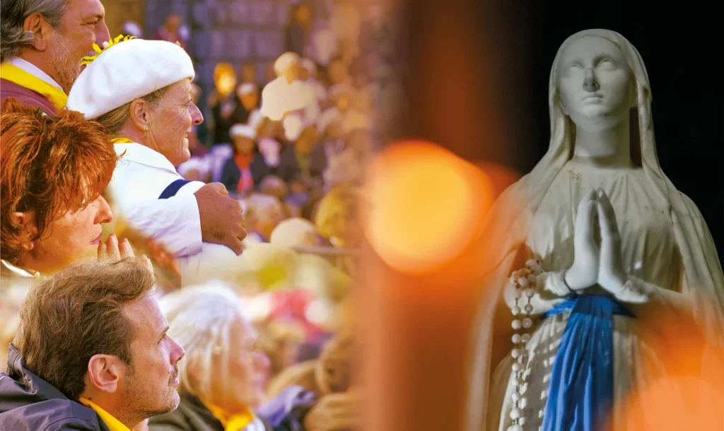 Pèlerins à Lourdes et statue de la Vierge Marie